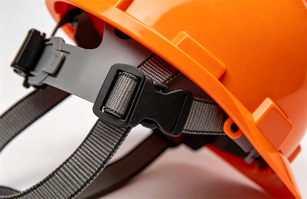 Close up of safety helmet adjustable chin strap buckle showing secure fit for rescue workers and shelter staff today now now now for bulk tornado emergency kit procurement and wholesale NGO relief orders today now