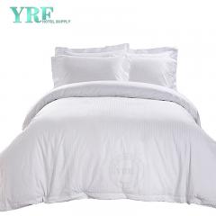 Roupa de cama da suíte de hotel